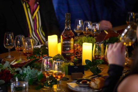 Bowmore Whiskey bottle on a table at a brand influencer event