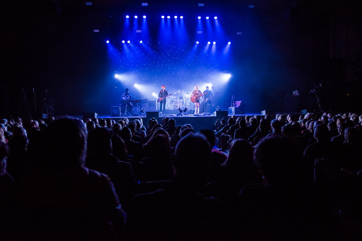 Close up shot of Whitehorse Performing at Massey Hall in Toronto