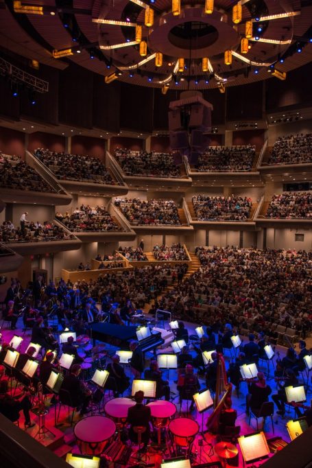 Wide photo from behind the orchestra at Roy Thompson Hall in Toronto