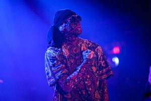 Member of Kalush Orchestra performing live on stage at The Opera House in Toronto