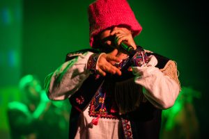 Oleh Psiuk of Kalush Orchestra wearing his signature pink bucket hat during a Toronto concert.