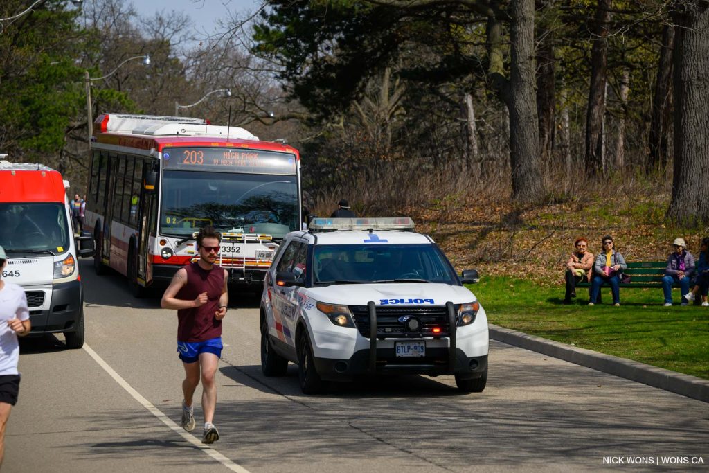 TTC bus and WheelTrans eacorted by Toronto Police bringing visitors to the otherwise car-free park closure